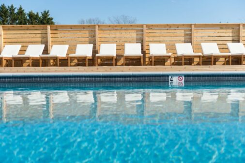Outdoor pool with lounge chairs