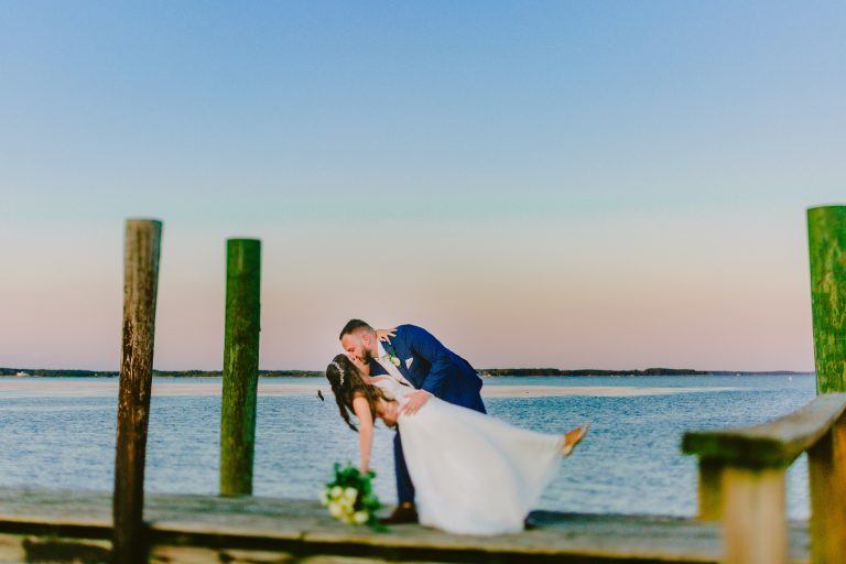 bride and groom on dock