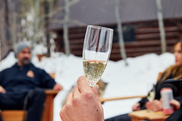 Glass of champagne at Apres ski