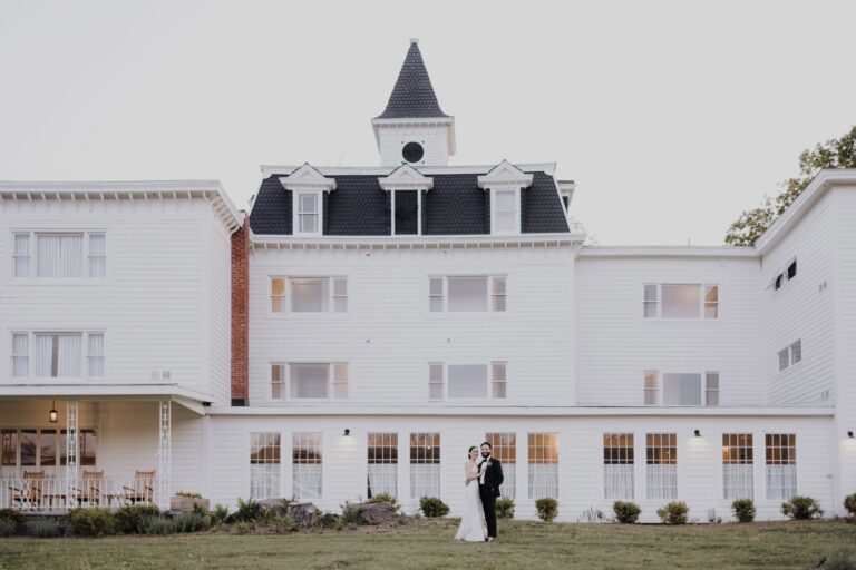 Bride & Grooom in front of Wylder Windham lodge