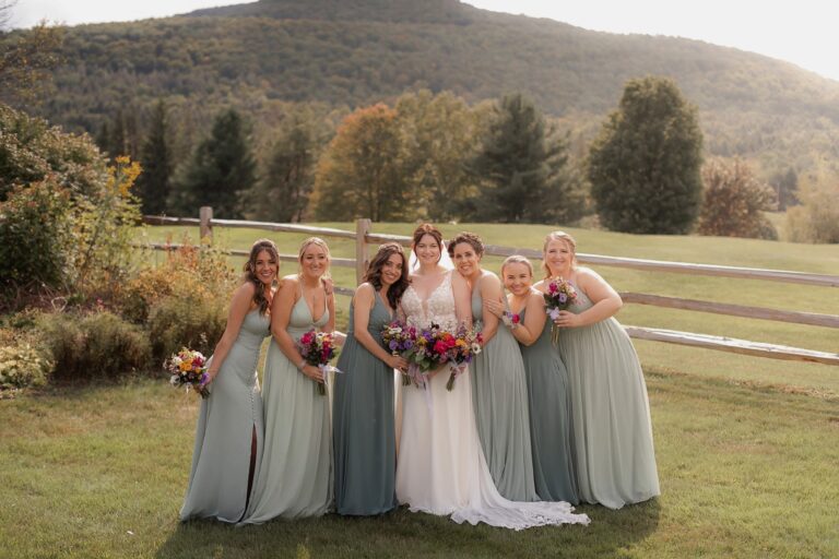 Bridesmaids posing in front of Windham Mountain